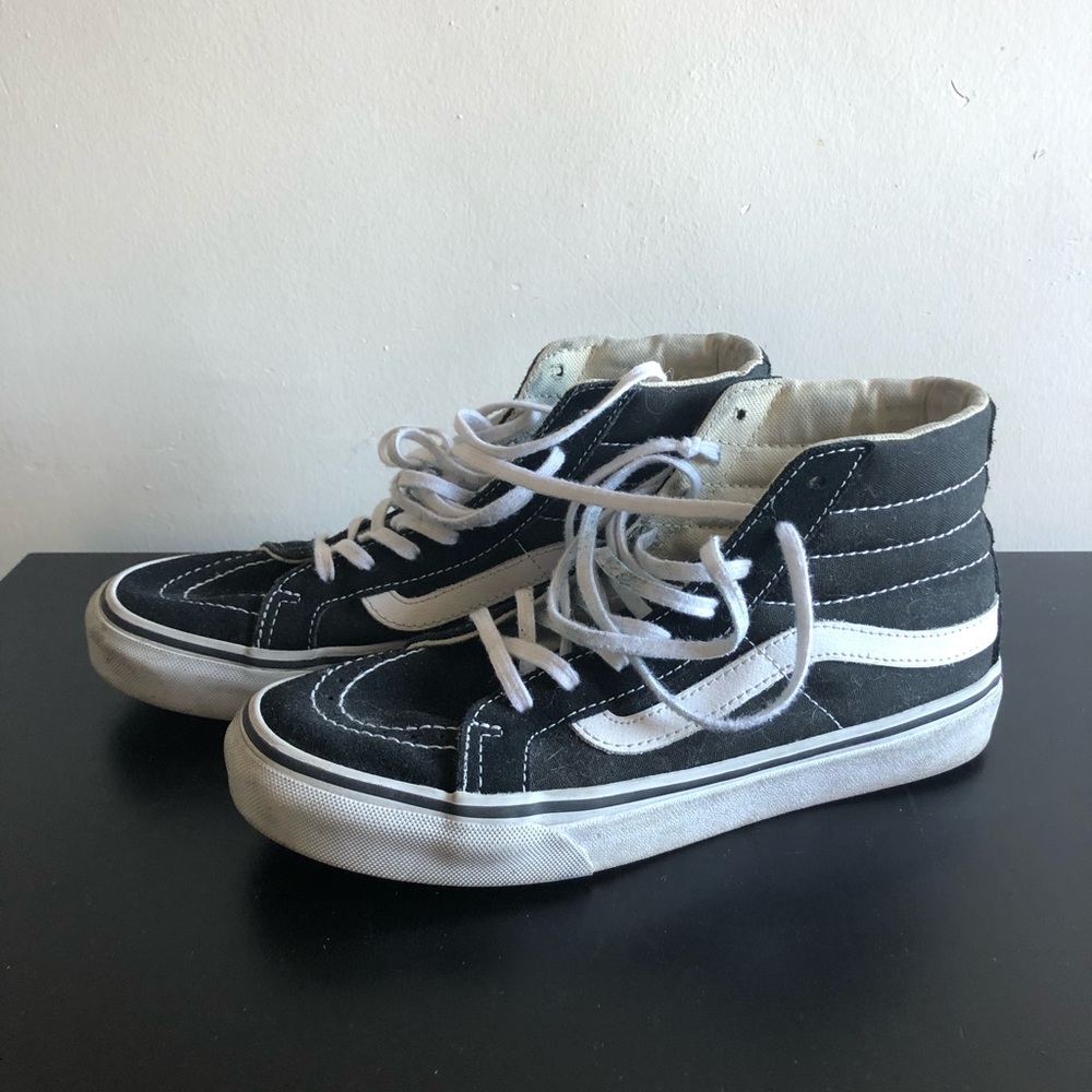 Vans black high top sneakers